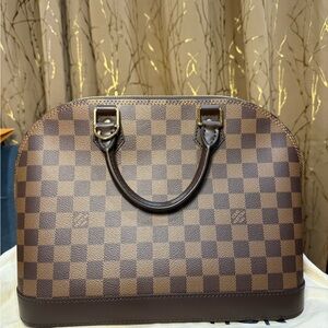 Louis Vuitton Alma PM in Damier Ebene canvas